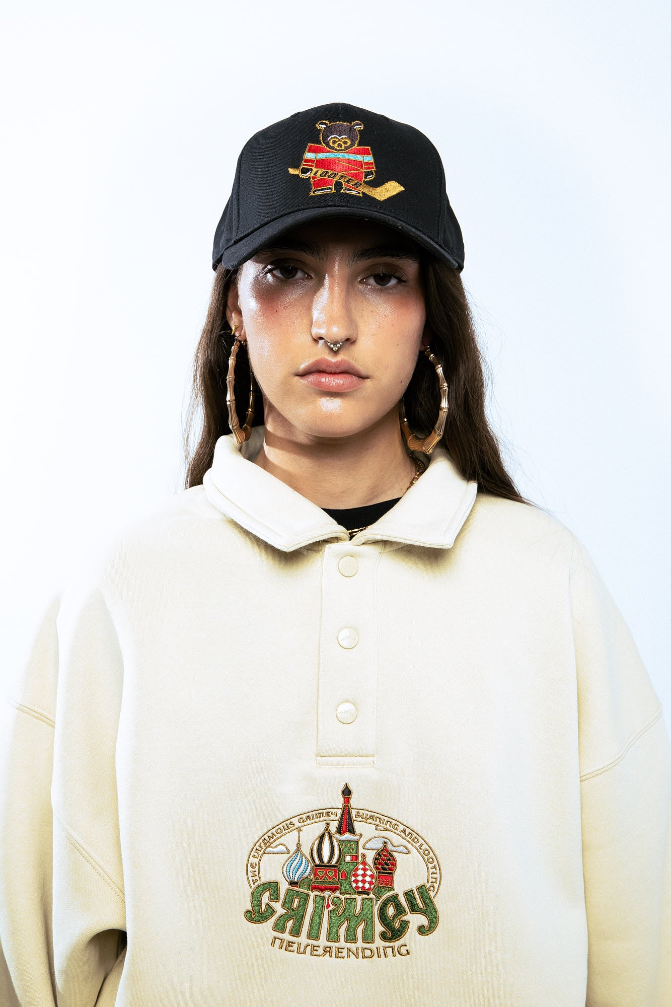 THE LOWER DEPTHS POLO SWEATSHIRT CREAM