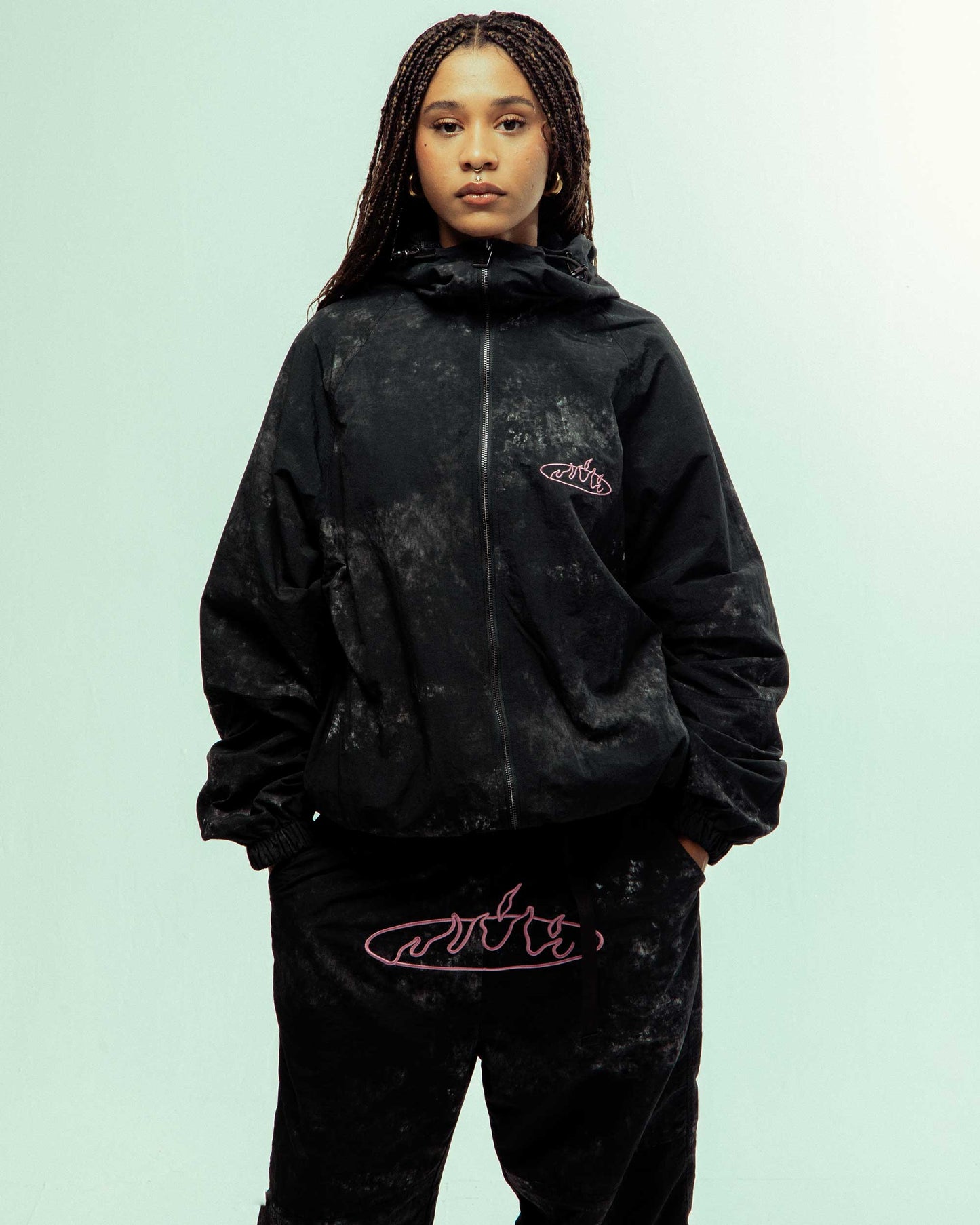 MELTED STONE NYLON TIE AND DYE TRACK PANTS BLACK