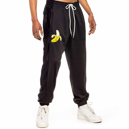 GRIMEY JUNGLE PUNCH MESH TRACK PANTS BLACK